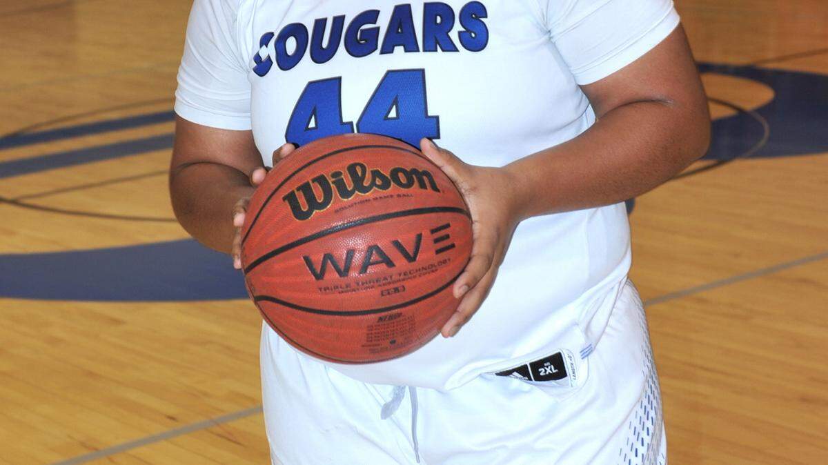 Brookstone's Naeisha McClain with the game ball that she used to score the 1001 point in her high school basketball career during the game against Marion County with 1:40 sec left in the 3rd period of the game Friday night, January 29, 2016