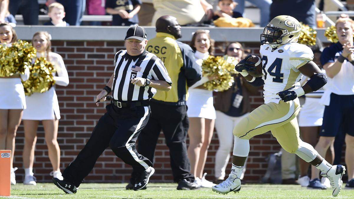 MIKE STEWART/Associated PressGeorgia Tech running back Marcus Marshall runs the ball against Pittsburgh during the first half Saturday in Atlanta. Marshall scored a touchdown on the 58-yard run.
