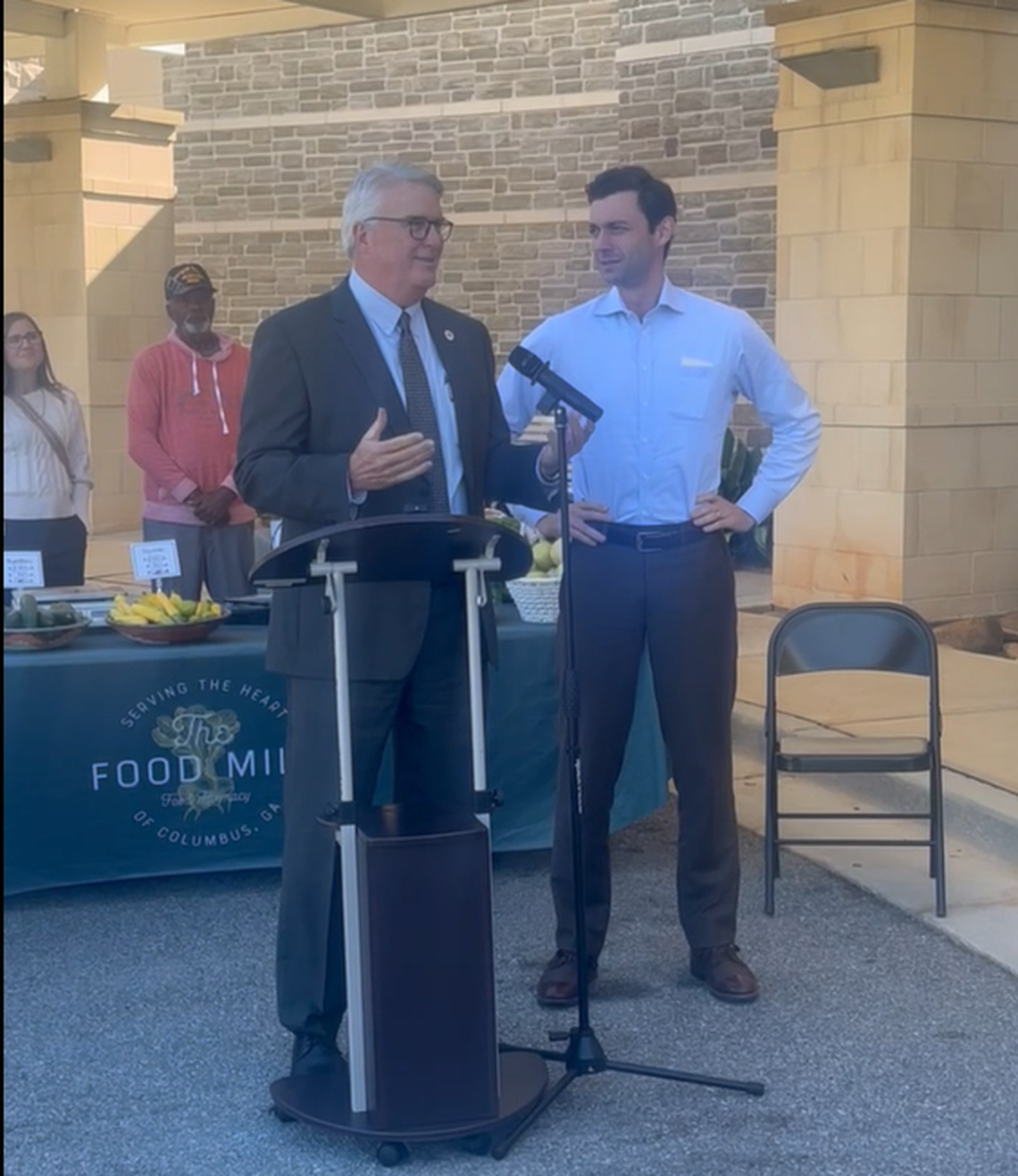 Columbus Mayor Skip Henderson speaks with Georgia Sen. Jon Ossoff about the poverty levels in Columbus, Georgia.