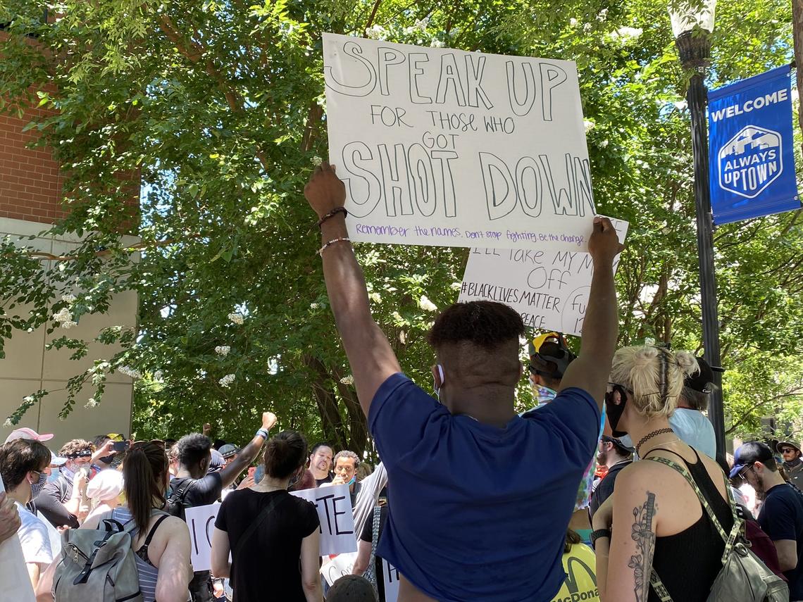 Over 200 people gathered in downtown Columbus, Georgia, May 31, 2020, to protest the death of George Floyd and support the Black Lives Matter movement. After marching up and down Broadway sidewalks, protesters gathered outside of the RiverCenter Parking Garage to share experiences of being black in America.