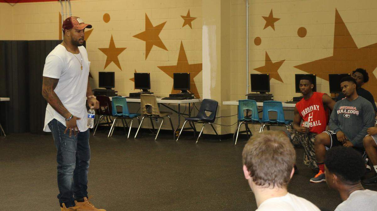 Philadelphia Eagles linebacker Marcus Smith, a Hardaway alum, returned to the school Thursday to talk with the cirrent players. (DAVID MITCHELL/dmitchell@ledger-enquirer.com)