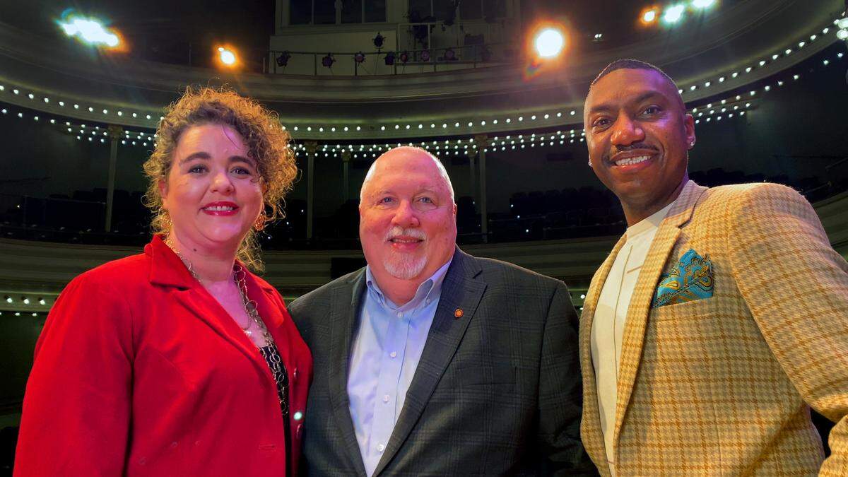 From left, Danielle Varner, Paul Pierce, and Keith McCoy pose for a photograph on the mainstage at the Springer Opera House in Columbus, Georgia. Upon Pierce’s retirement, Varner, currently the managing director, will take on Pierce’s CEO duties in the role of executive producer. McCoy, currently the associate artistic director, will become the artistic director. The leadership change will be effective Oct. 1. 01/26/2023