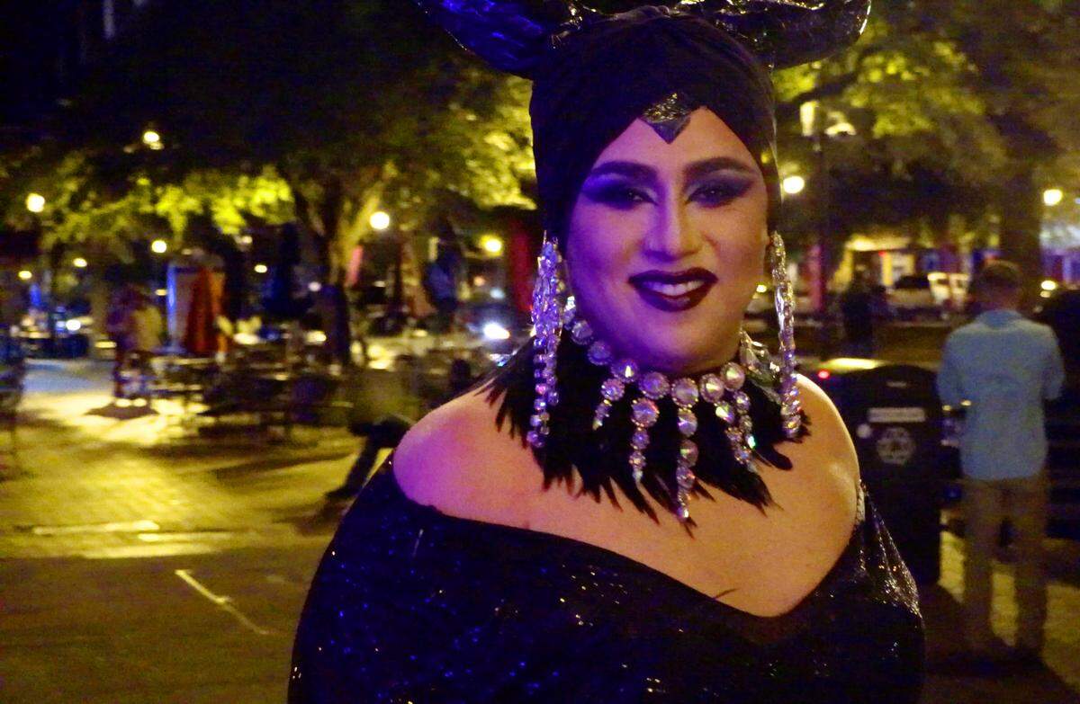 Luis Hernandez pauses for a photograph after preparing for a recent drag show at The Cantina Grill, Bar & Lounge in Columbus, Georgia. Nearly every other week, drag kings and queens perform at The Cantina and Hernandez is the one making sure everything runs smoothly, even if that means making last-minute schedule tweaks before his costume is finished. Hernandez goes from shy server at the downtown Mexican restaurant and bar to event organizer and elegant drag queen Zoria Garcia.