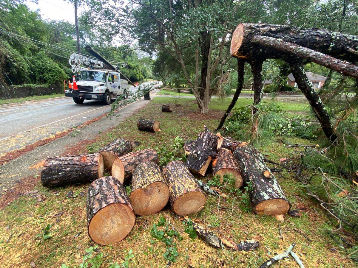 Workers begin the process of restoring power to residents near the intersection of Forrest Road and Alta Vista Drive in Columbus on Sept. 27, 2024, after the storm associated with Hurricane Helene came through the city.