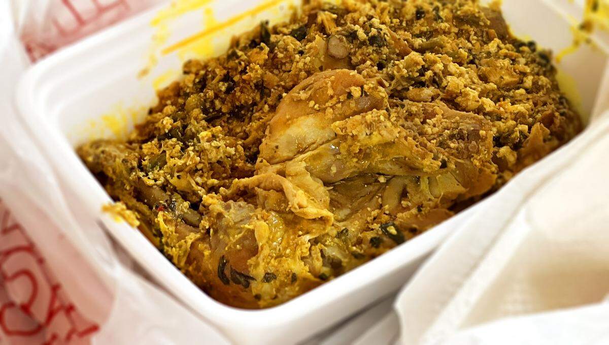 Chicken egusi soup is one of the dishes served by Wakis African Kitchen in Columbus, Georgia.