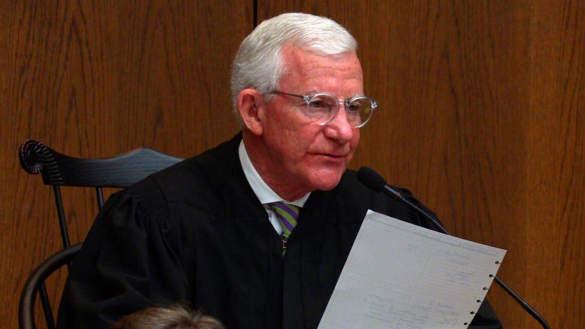 Superior Court Judge William C. Rumer reads a sentencing in Superior Court in 2019.