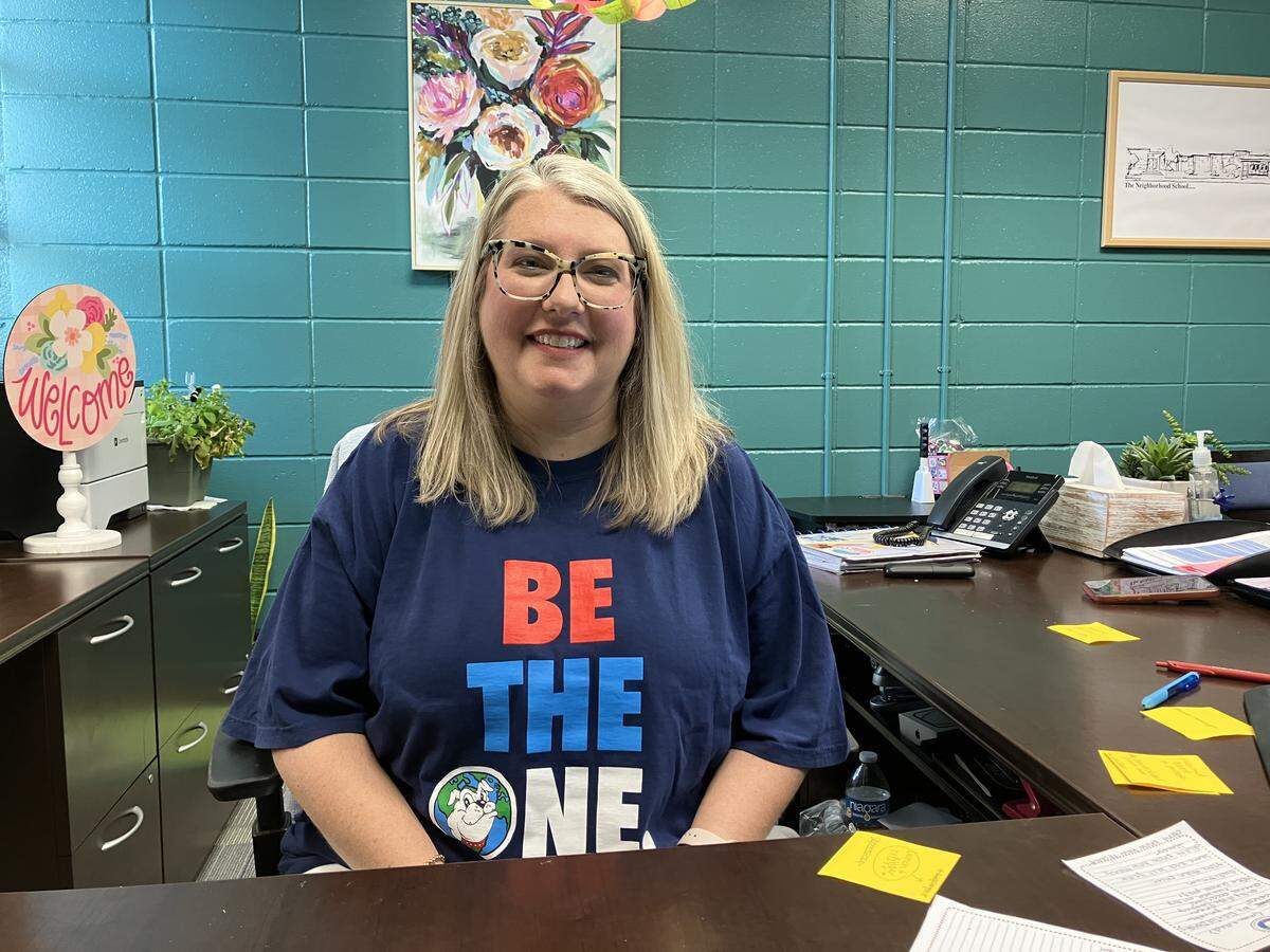 The day after the Muscogee Educational Excellence Foundation named Clubview Elementary School physical education teacher Chris Grier as the Teacher of the Year in the Muscogee County School District, Clubview principal Cathleen Heider is pictured May 8, 2026, wearing a “BE THE ONE” T-shirt that sums up his teaching philosophy.