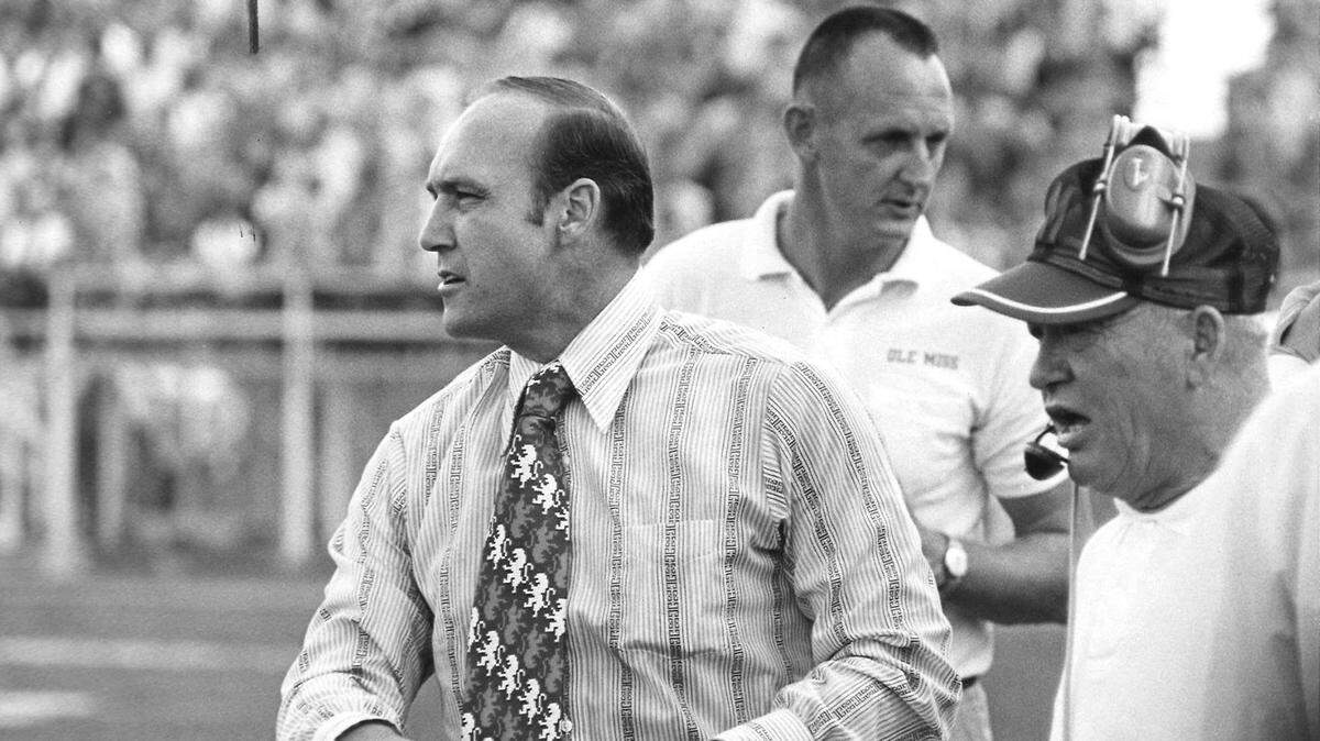 Former Ole Miss football player and coach Billy Kinard (left) passed away Saturday at 84 years old
