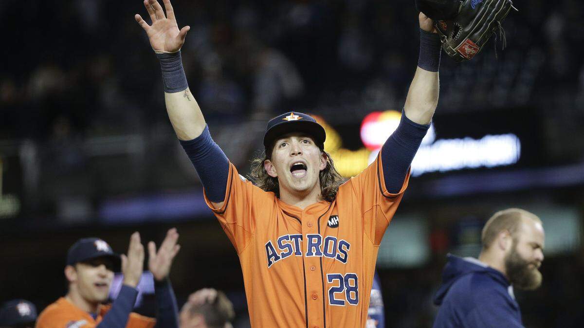 Associated PressHouston Astros left fielder Colby Rasmus motions to fans after the Astros defeated the New York Yankees 3-0 in the American League wild card baseball game last month.