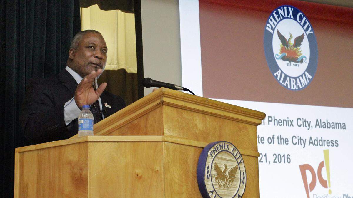 Photos by ROBIN TRIMARCHI/rtrimarchi@ledger-enquirer.comPhenix City Mayor Eddie Lowe begins the State of the City Address Thursday in the Central Activities Center.
