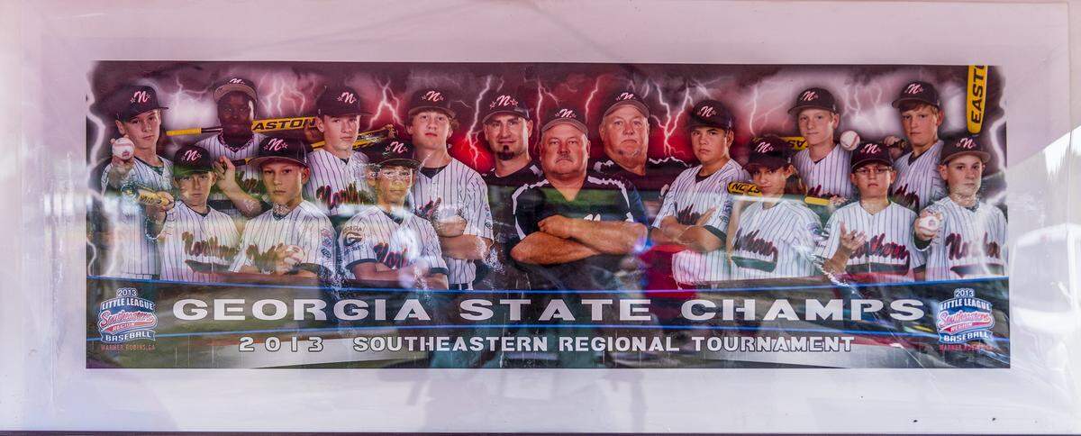 A photograph of the 2013 state championship Northern Little League team was on display during a ceremony honoring Randy Morris and Donnie Coulter Wednesday night. 04/28/2021