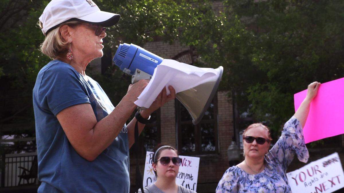 Ilene Kent speaks to people gathered in downtown Columbus Thursday evening to protest the recent U.S. Supreme Court’s decision about abortion rights. 06/30/2022