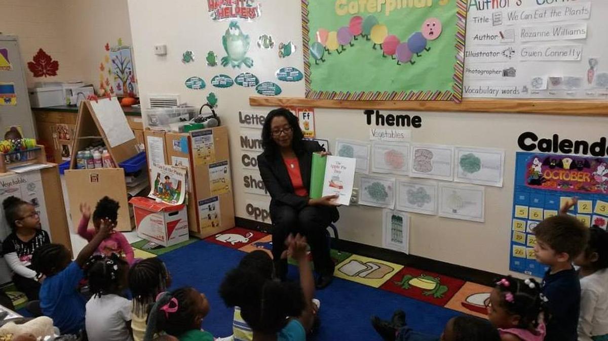 Belva Dorsey, chief executive officer of Enrichment Services Program Inc., reads to Head Start children at the agency’s Child Development Center. The agency recently published a community assessment with demographic information about the nine counties that it serves.