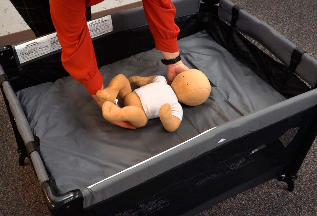 Pam Fair, director of Safe Kids Columbus, uses a portable play yard and bassinet to demonstrate the ABCs of Safe Sleep. To further emphasize safe sleep practices, the nonprofit Safe Kids Columbus is hosting “Safe Sleep Classes” at 4 p.m. Oct. 15, Nov. 12 and Dec. 17 at 615 19th St., across from the John B. Amos Cancer Center. Each hour-long class is free, said Pam Fair of Safe Kids Columbus. Anyone interested may call 706-321-6720. The program is intended for women who are in or close to their third trimester of pregnancy. Each participant who qualifies for Medicaid can get a free portable play pen with a bassinet, commonly called a “Pack N Play,” which is safe for putting a baby to bed in the mother’s room. Fair said the priority will be providing those to parents who don’t already have one.