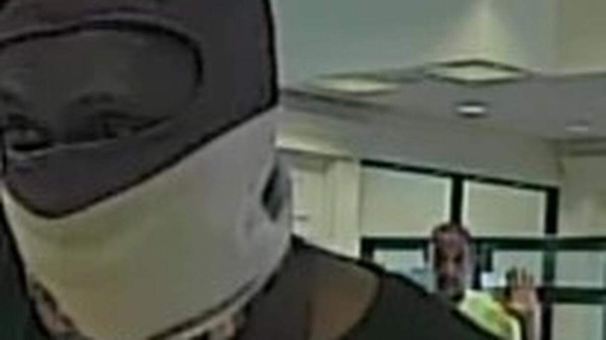 Columbus police are trying to identify man who robbed SunTrust Bank on Friday.
