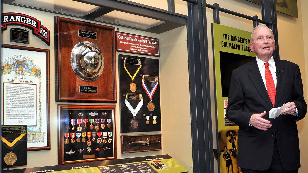 Photos by DARRELL ROADEN/Special to the Ledger-EnquirerRetired Col. Ralph Puckett Jr. speaks at the unveiling of an exhibit at the National Infantry Museum honoring his military service Monday.