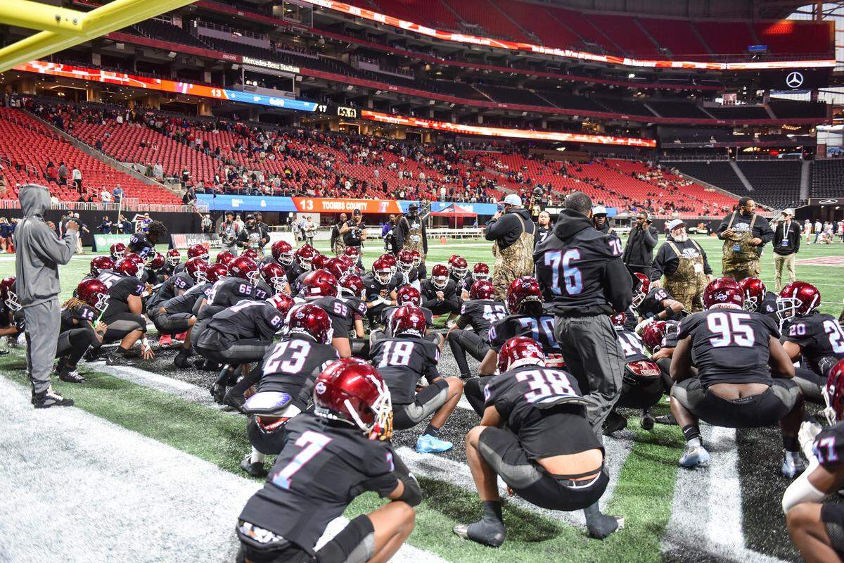 The Carver football team meets Dec. 16, 2025, on the Mercedes-Benz Stadium field in Atlanta, where they beat Hapeville Charter 24-7 for the Georgia High School Association Class 2A state championship.