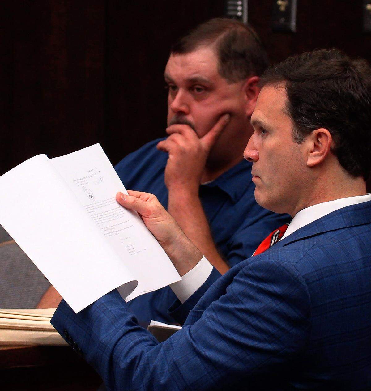 Attorney John Martin, front right, and his client Donald Keith Phillips listen to testimony in court . There was a pretrial hearing before Superior Court Judge Gil McBride on February 21, 2019, for Haynie and Donald Keith Phillips, both of whom are charged in the 2004 cold-case murder of Haynie’s ex-husband Kirby Smith.