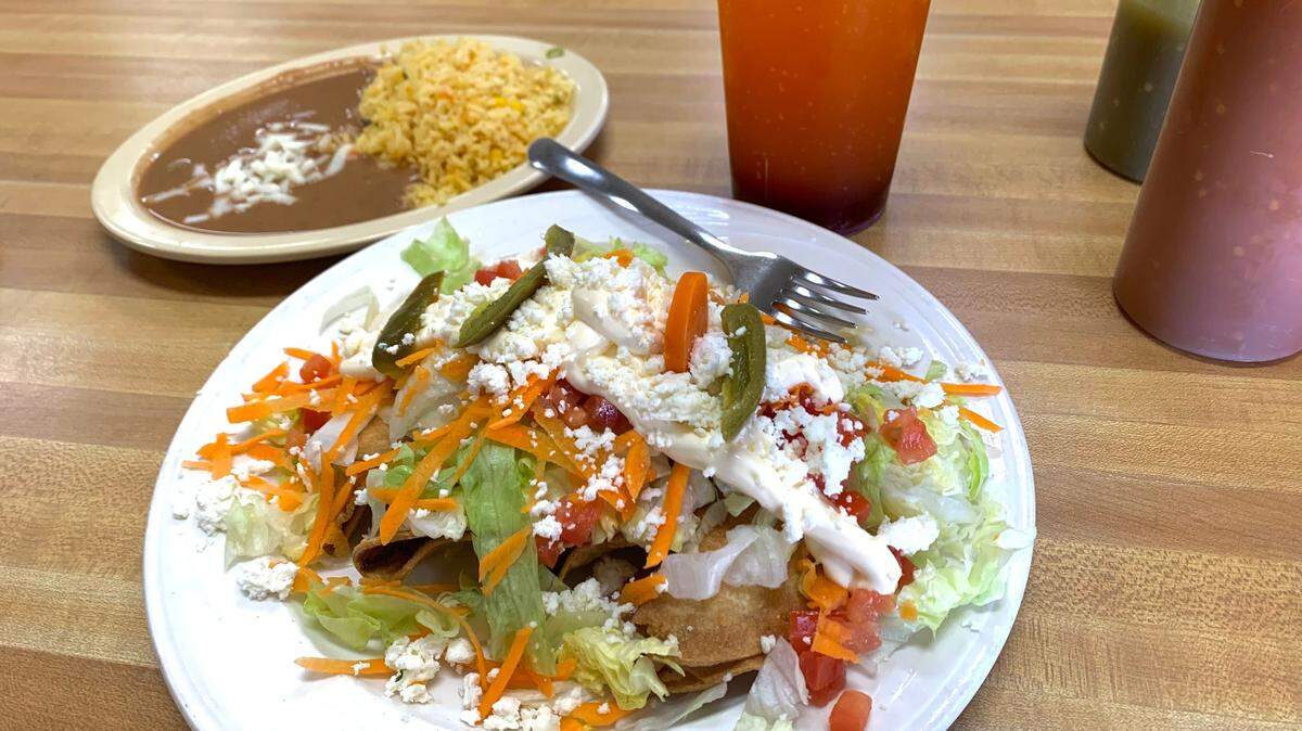 An order of chicken empanadas, refried beans and rice from Super Mercado Las Americas on Hamilton Road in Columbus.