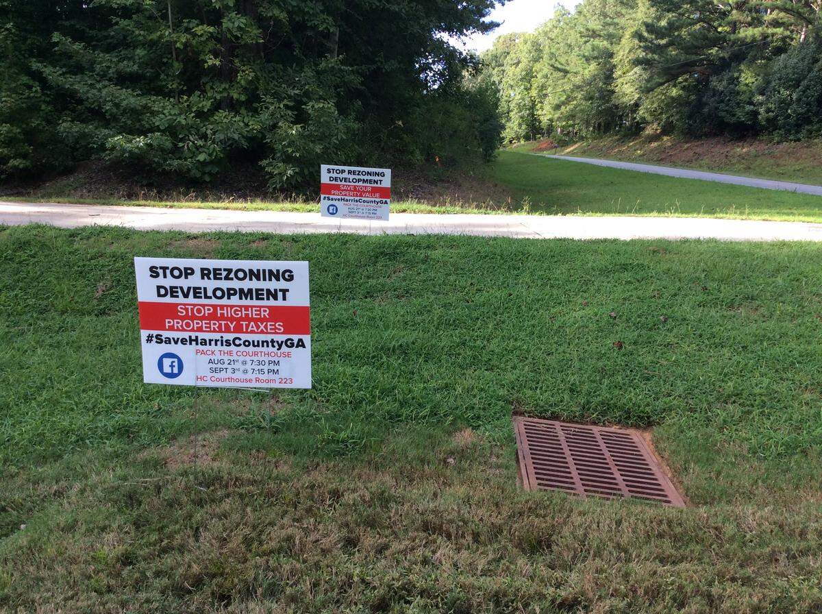 Yard signs placed around Harris County represent opposition to a high-density development located at U.S. 27 and Grey Rock Road.