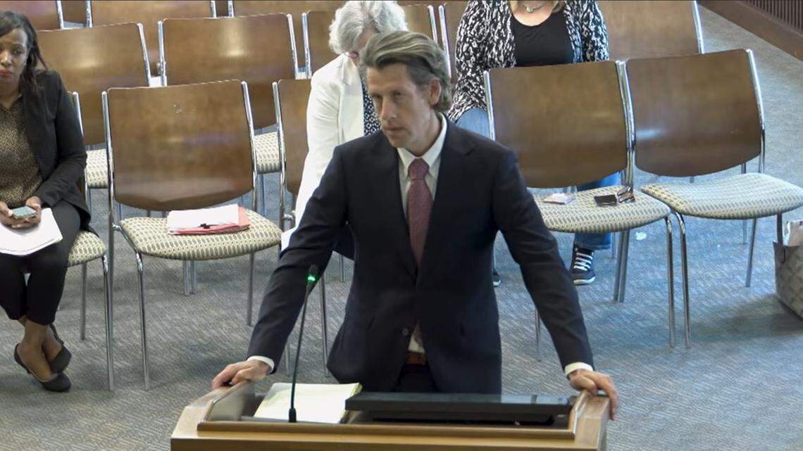 Andrew Ruhs, executive director of the Columbus Botanical Garden, speaks during an April 14, 2026, Columbus Council meeting to request a refund for a property tax payment made after the nonprofit failed to file an exemption on donated land.