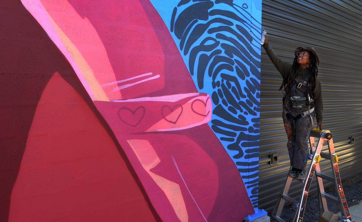 Charity Hamidullah is the muralist creating a new mural at Highside Market in Columbus, Georgia. 10/09/2023
