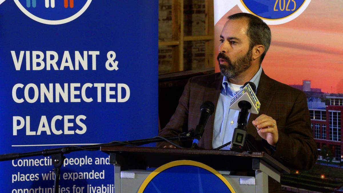 Will Burgin, chair of the metrics committee of Columbus 2025’s Vibrant and Connected Places Action Area, speaks at a Monday morning press conference announcing Columbus’ Vibrant and Connected Dashboard is now online at www.Vibrantandconnectedcolumbus.com.
