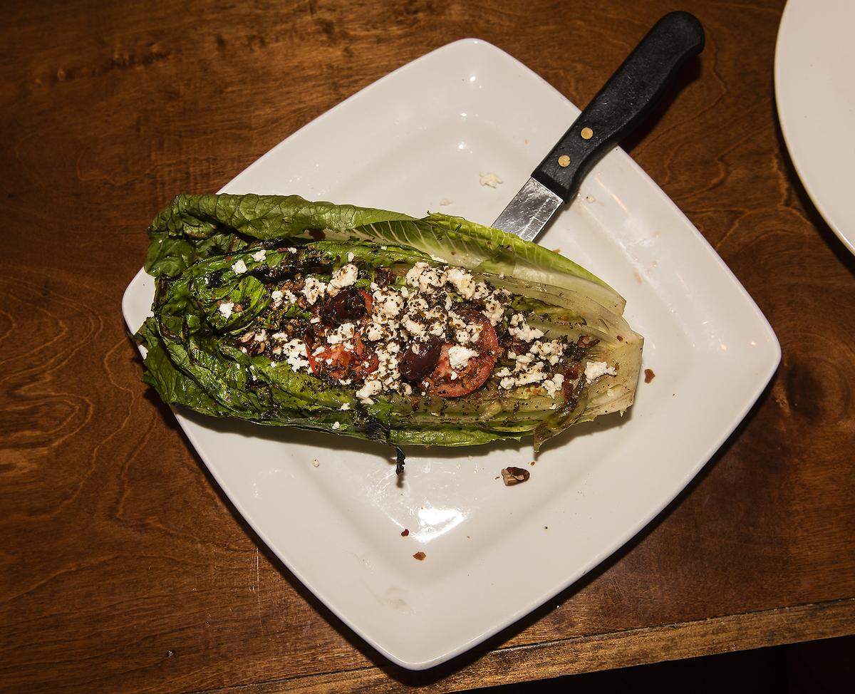 The $30 Restaurant Week menu includes the Bluewater Salad, a grilled romaine wedge with bacon, kalamata olives, tomatoes, feta,pecans and citrus herb vinaigrette.