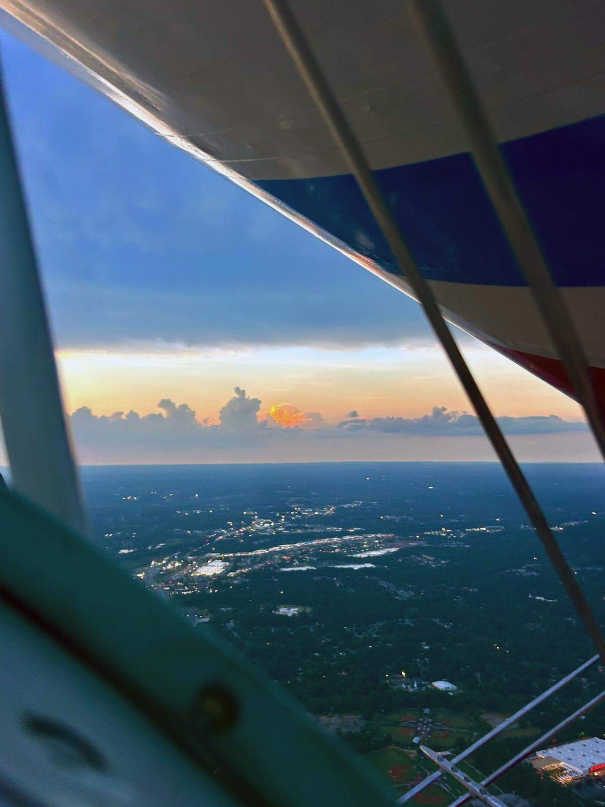 This is the view from the cockpit of Marty Flournoy’s Pitts Special aerobatic biplane as he flies it over the Columbus Airport. 