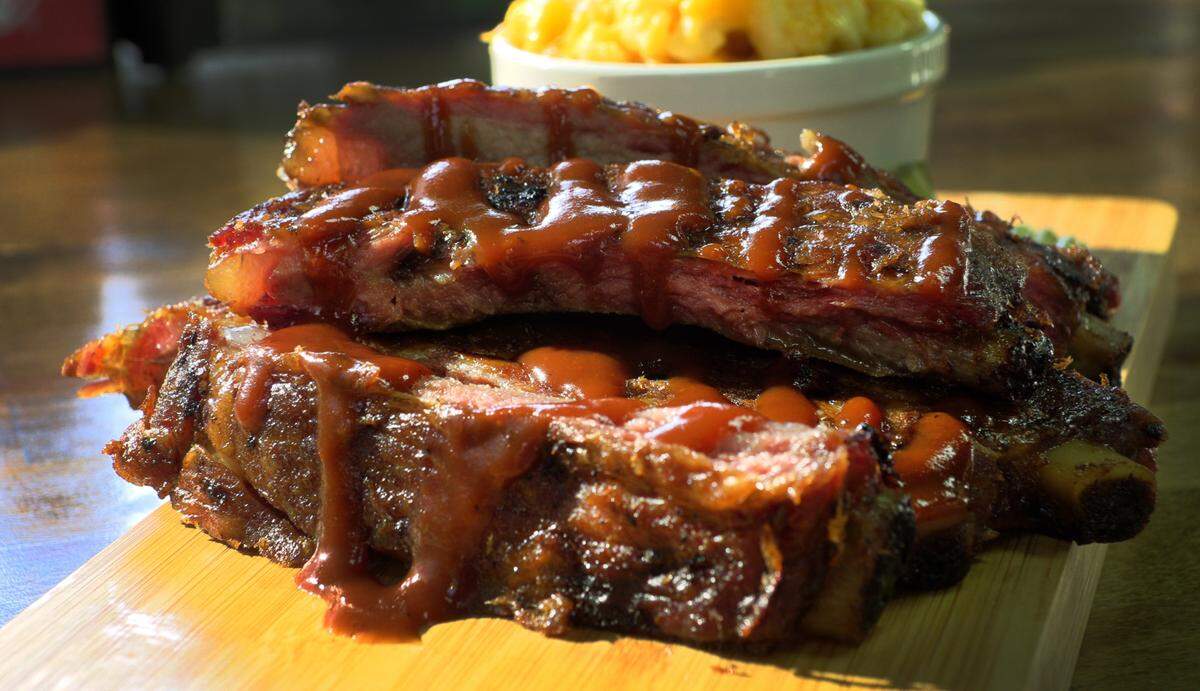 This is the slow-smoked ribs and mac and cheese at Mike & Ed’s Bar-B-Q location at 7590 Schomburg Road in Columbus, Georgia. 04/18/2023