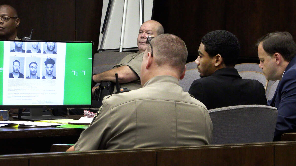 Zajaliq Riley, second from right, is on trial for murder in a Columbus, Georgia courtroom for the fatal shooting of Devion Miley in 2021. 08/08/2023