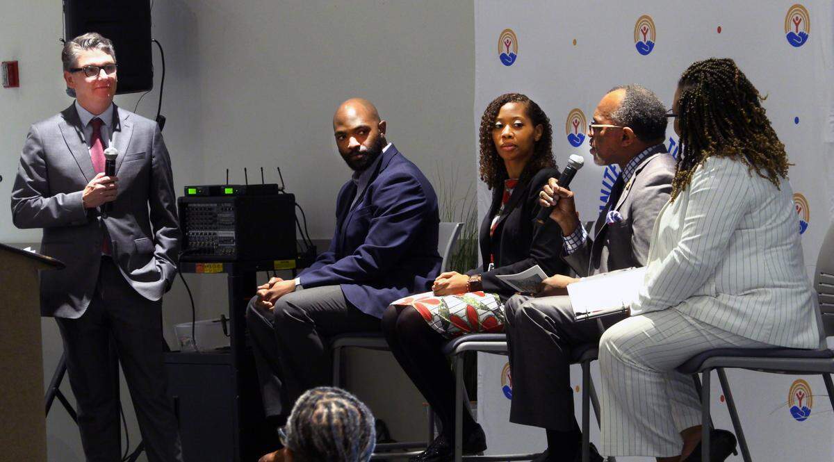 Oz Roberts, second from right, answers a question Thursday during the United Way’s 3rd Annual Black History Panel in honor of Black History Month at the Columbus Civic Center in Columbus, Georgia. The panel discussion was moderated by Ben Moser, far left, and also included Norman Hardman, Dr. Asante Hilts, and Toyia Tucker. 02/10/2023
