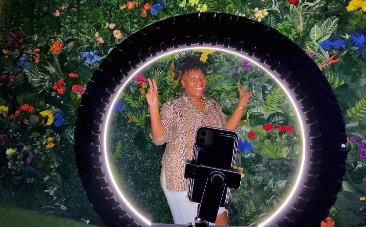Robin Davis takes a selfie at The Photoshop-Selfie House Museum in Columbus, Georgia. 07/13/2022