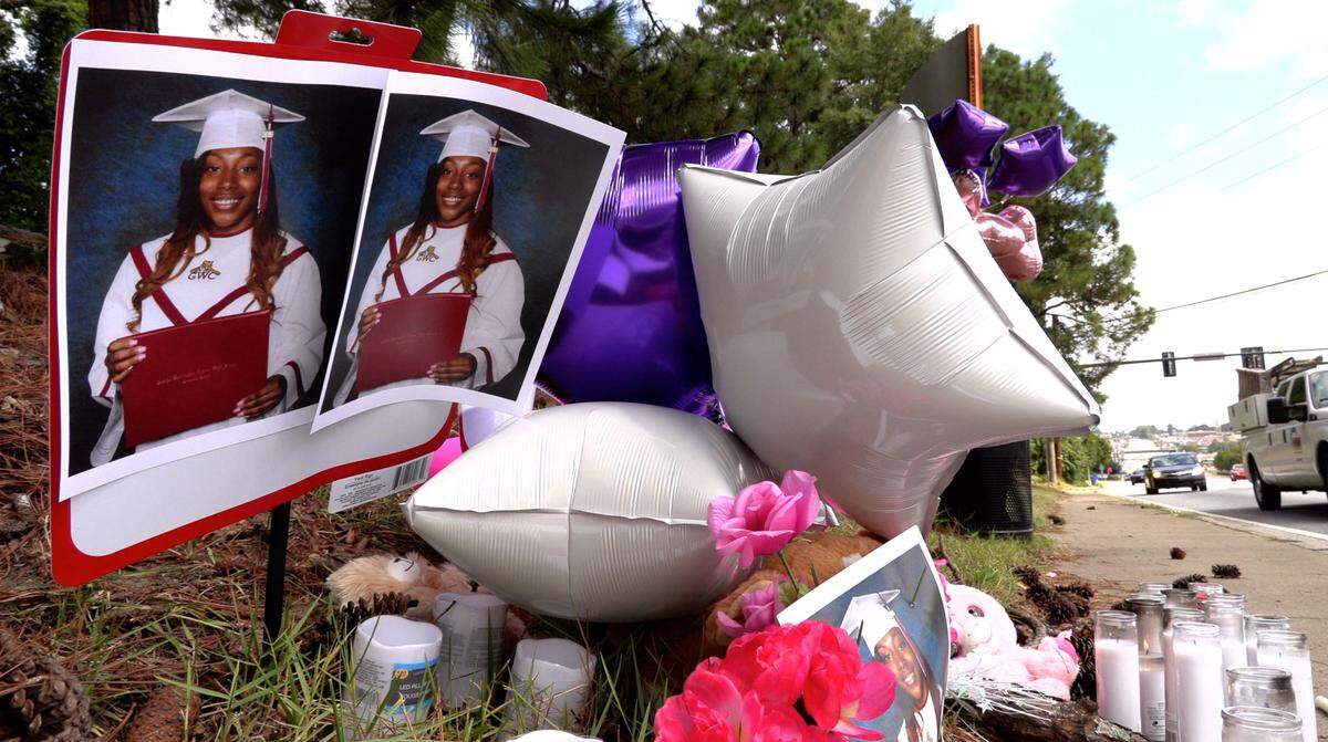 Destinee Virgin, 18, was shot and killed Sept. 22, 2018, near the intersection of Macon Road and Rigdon Road. Her ex-boyfriend, Markel Ervin, has been charged in her murder. Witnesses said Virgin was running through traffic looking for help before the shooting. Family and friends created this memorial for her near the site.