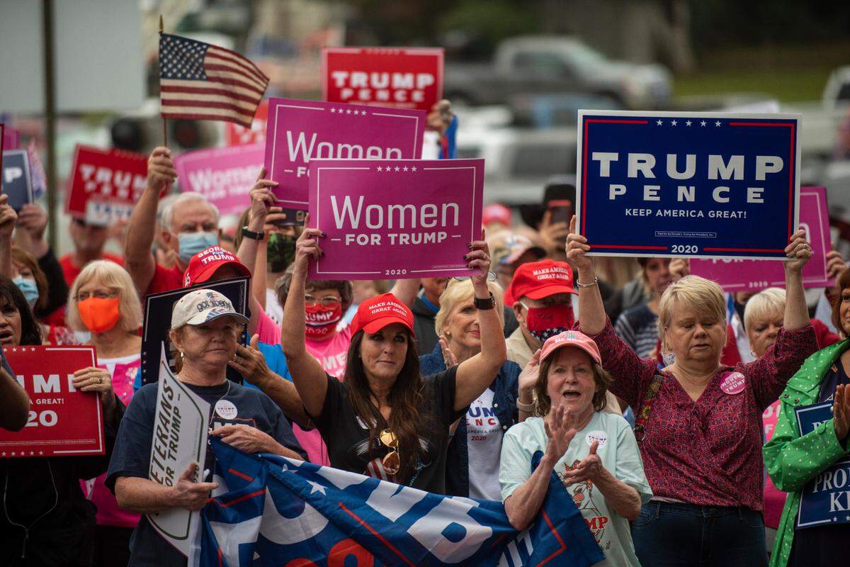Trump supporters listens to Gov. Brian Kemp speak at a MAGA rally in Manchester, Georgia, on Oct. 27, 2020. The rally was held on the same day Joe Biden visited Warm Springs just a few miles away.