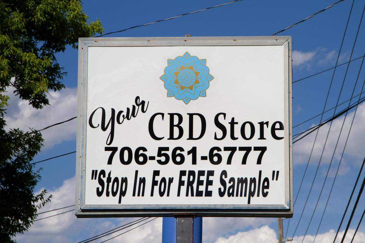 The sign in front of the Columbus location of Your CBD Store which is owned by Thomas and Pamala Connor.