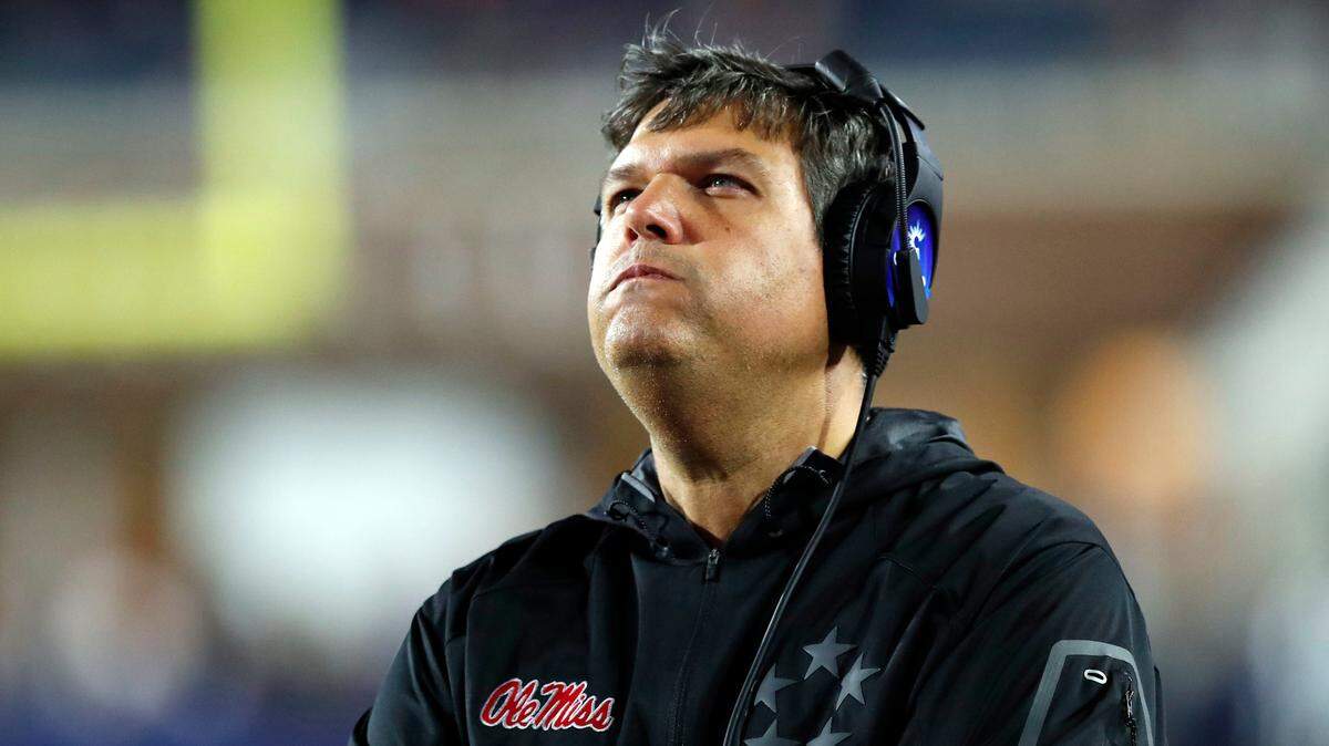 Mississippi head coach Matt Luke looks at the replay of a play on the video board in the final minutes of their NCAA college football game against Texas A&M in Oxford, Miss., Saturday, Nov. 18, 2017. Texas A&M won 31-24