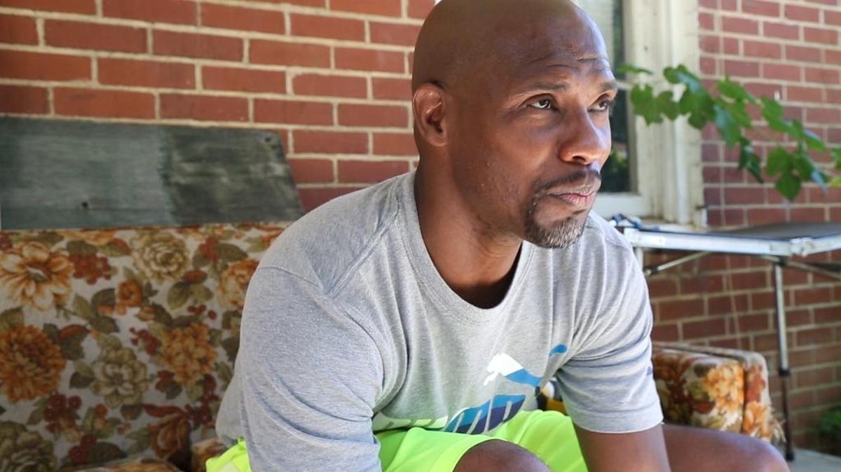 Eugene Thomas, a former Columbus crack dealer, prepares for boxing at a home on 6th Avenue. He spent 21 years in prison for voluntary manslaughter and is now in the community trying to get his life on track.