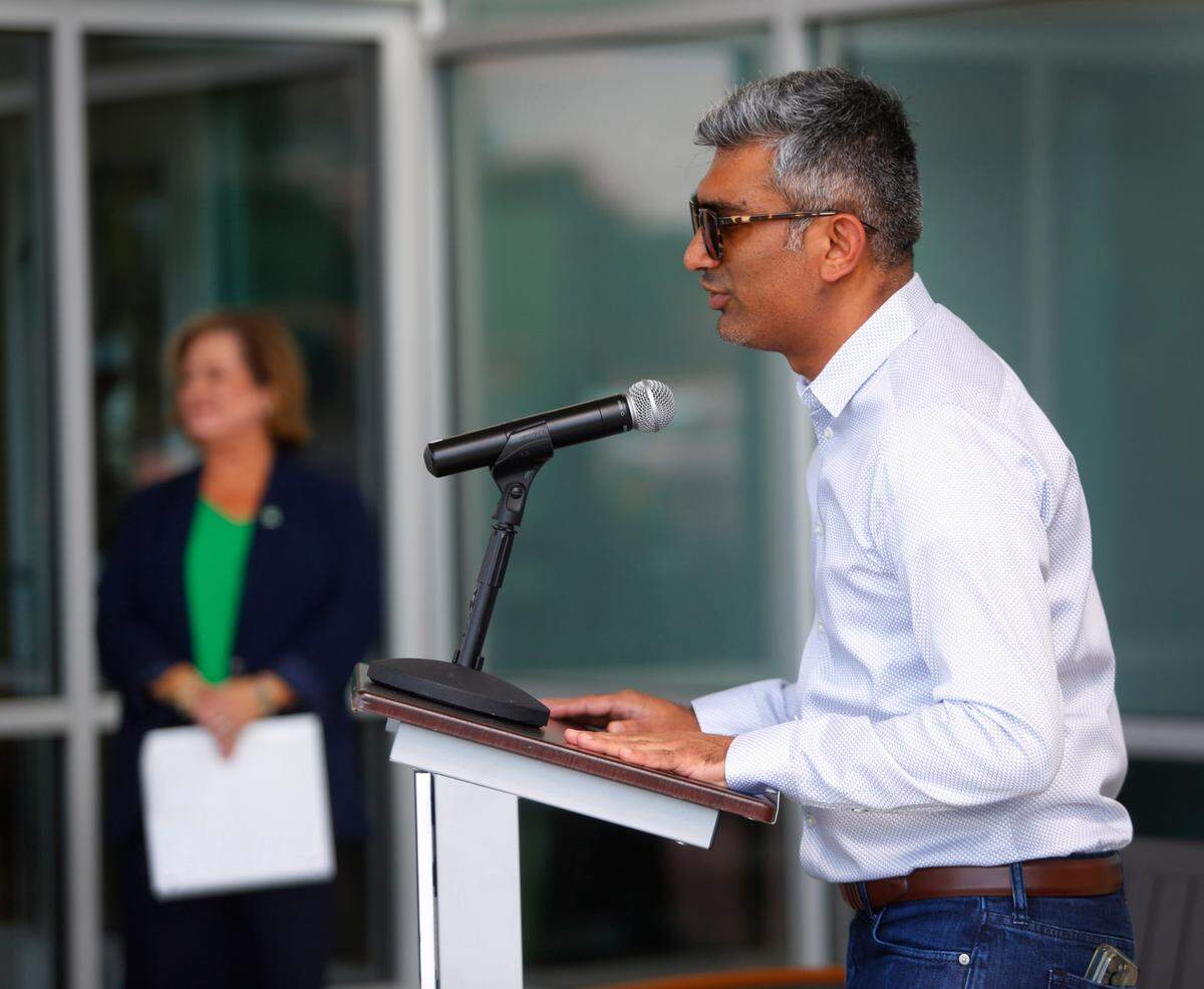 Rinkesh Patel, chief executive officer and founder of RAM Hotels, speaks during the grand opening celebration of their new Holiday Inn Express Columbus Northeast, located at 2761 Warm Springs Rd. 07/18/2024