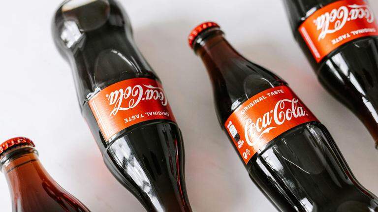 Coca-Cola to sell classic Coke with cane sugar in US following Trump request. Here’s when