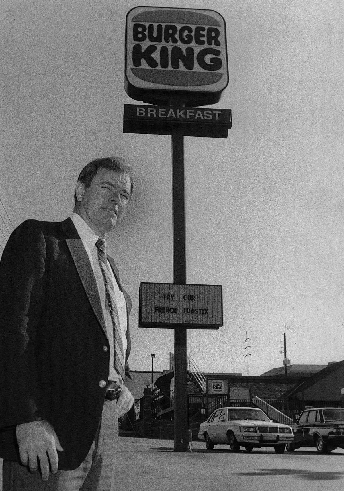 Marvin Schuster poses in 1986 at one of his Burger King restaurants in Columbus.