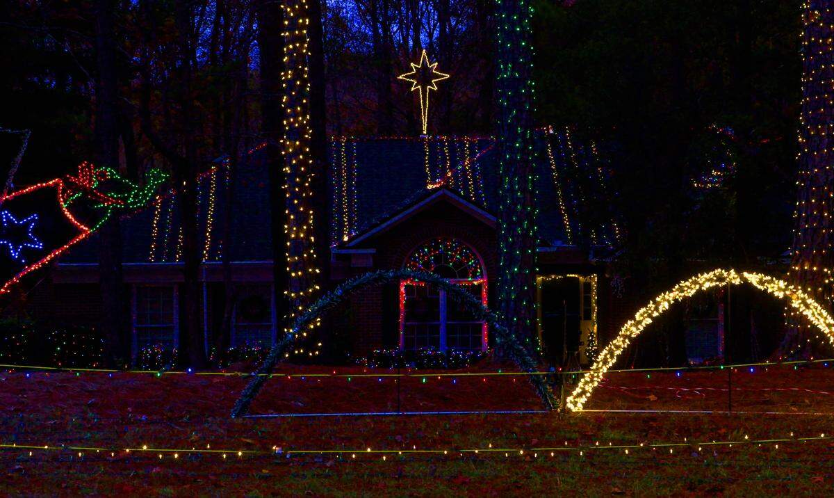 Foster Lambertus has created a large display of Christmas lights, known as Foster’s House of Christmas, in Midland, Georgia. The display is synchronized to music. 12/13/2024