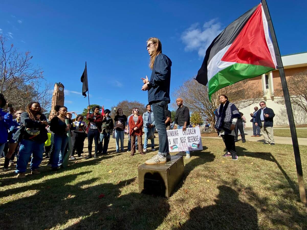 A protester speaks to the crowd at the pro-Palestine rally at CSU.