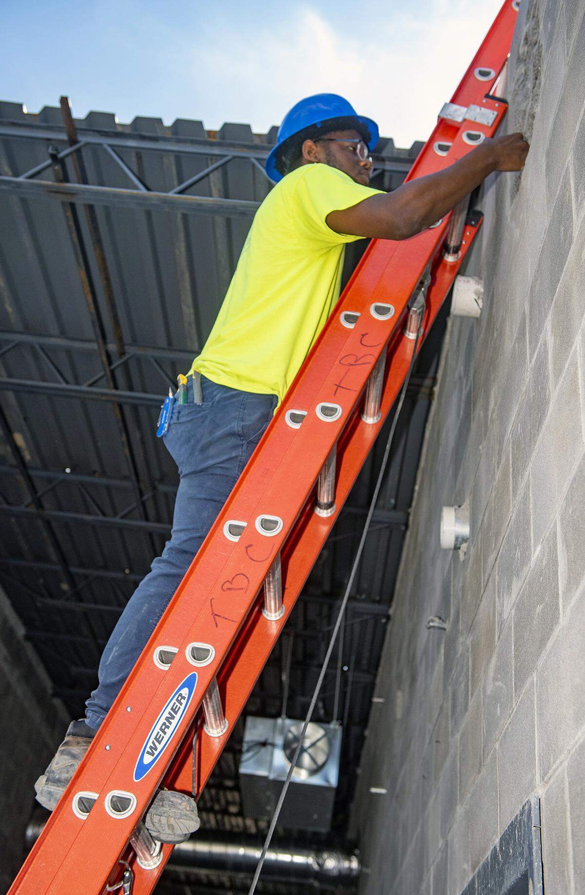 Central High School student Dearius Scott works as a construction intern on the job site of the Career Tech annex at the school. 5/20/2021