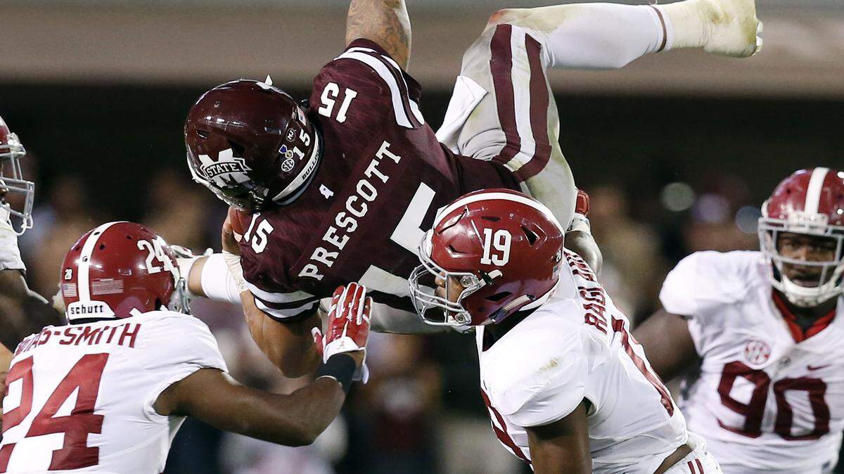 Associated PressAlabama's defense stops Mississippi State quarterback Dak Prescott during the second half of last Saturday's game in Starkville, Miss.