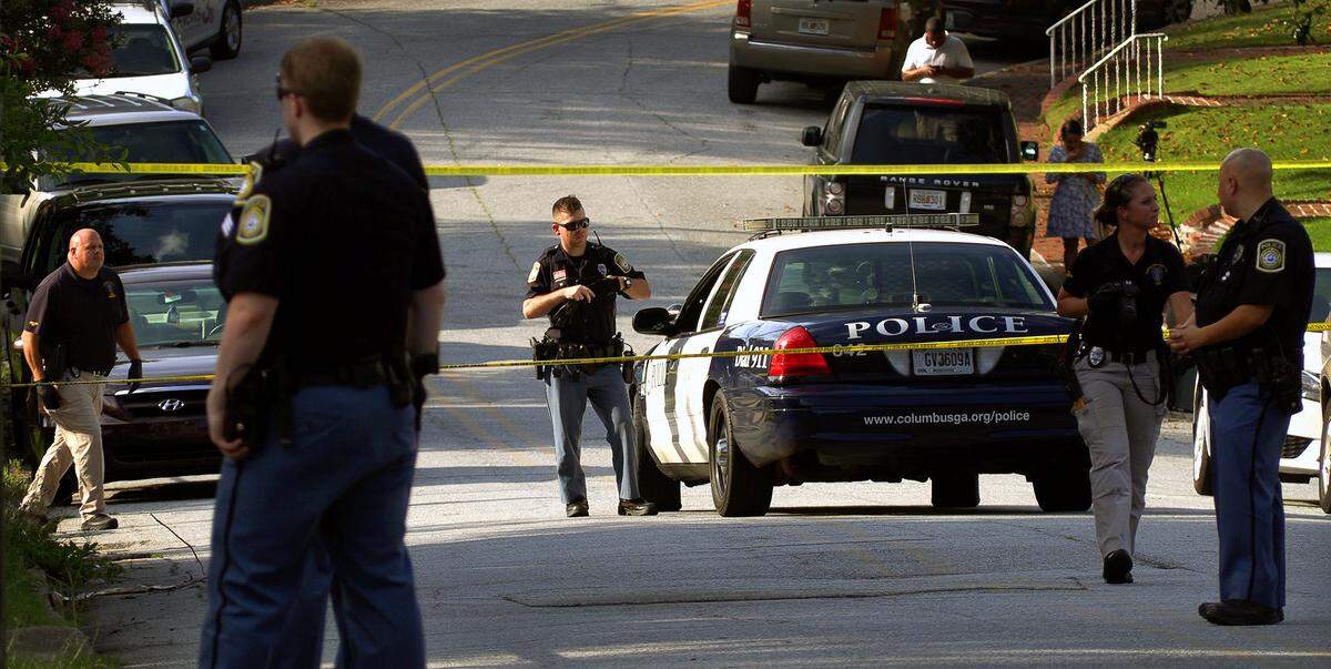 Police investigate the scene of a shooting on June 11, 2019 on 18th Avenue in Columbus, Georgia. Courvoisia Brenica Wilson appeared in Columbus Recorder’s Court Tuesday, July 15, 2019 for a preliminary hearing related to the incident. She faces charges of aggravated assault and possession of a firearm or knife during the commission of a crime. Go to www.ledger-enquirer.com for video from the scene.