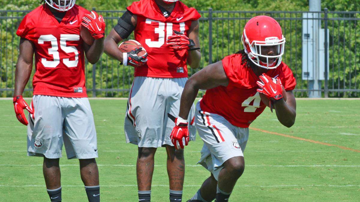 STEVEN COLQUITT/UGAGeorgia running back Keith Marshall (4) during the Bulldogs' session on the Woodruff Practice Fields Aug. 5, in Athens, Ga.