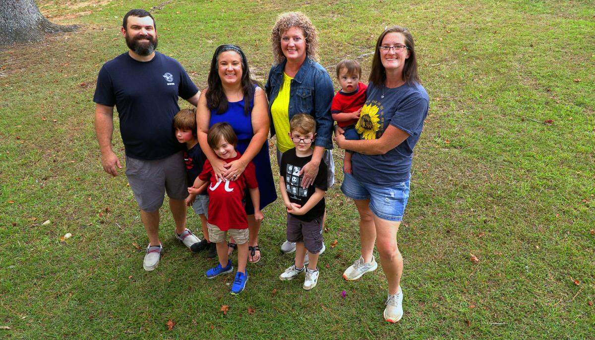 From left, Michael Defenbaugh, River Defenbaugh,6, Carrie Defenbaugh, Grayson Defenbaugh,8, Melissa Clark, Oliver Barnes,6, Samuel Barnes,2, and Tara Barnes, pose for a group photo recently at Idle Hour Park in Phenix City, Alabama.