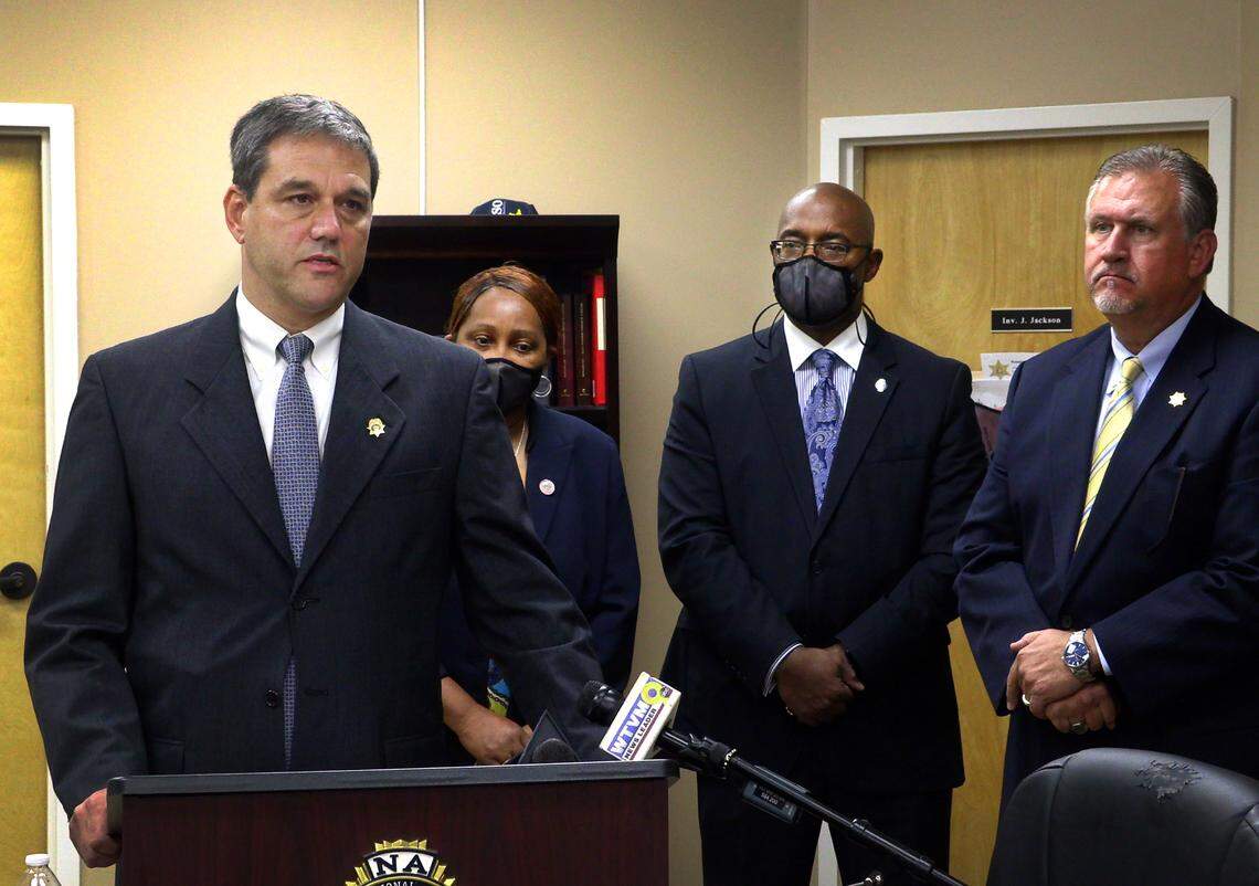 Russell County Chief Assistant District Attorney Rick Chancey, left, speaks during a Wednesday morning press conference announcing the arrest of Kristy Siple, 35, also known as Kristy Hoskins, Listening are, Joyce Dent-Fitpatrick, assistant police chief at the Columbus Police Department, Columbus Police Chief Freddie Blackmon, and Russell County Sheriff Heath Taylor. 12/29/2021