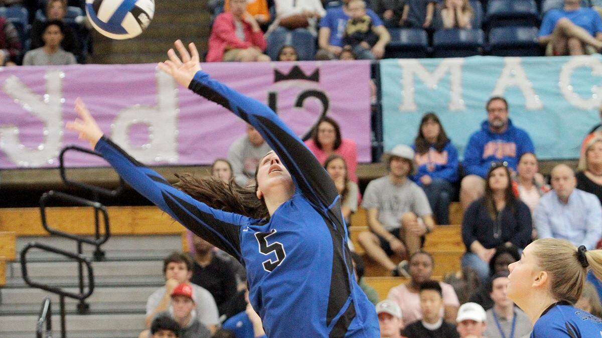 Columbus High’s Ashley Cox returns the ball against Northwest Whitfield in a three-game sweep Saturday during the Georgia Class AAAA state quarterfinals. The Blue Devils won 25-14, 25-20 and 25-10 to advance to the semifinals.
